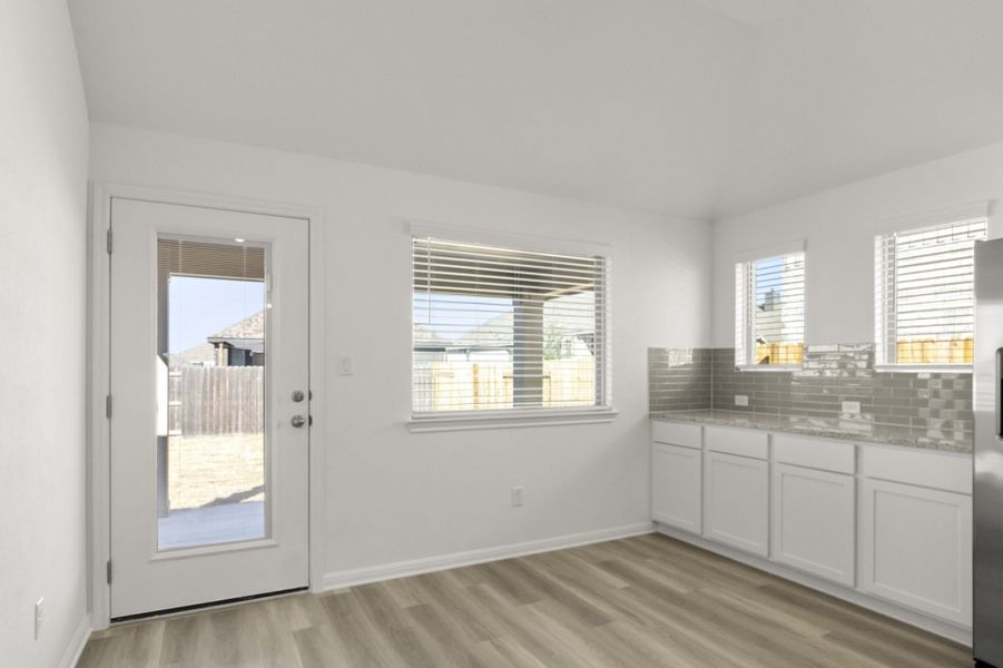 Furnished interior view inside a new home in Crosswinds, Kyle (Image 9).