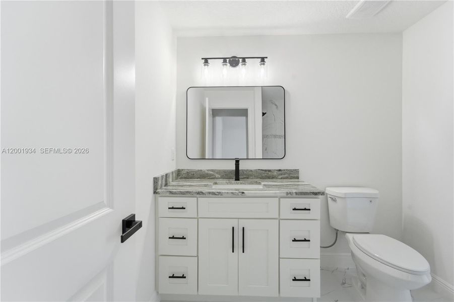 Furnished interior view inside a new home in , Port St. Lucie (Image 9).