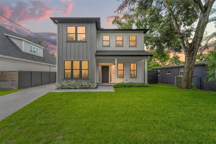 Front exterior of a new home in , Tampa, FL, highlighting curb appeal (Image 1).