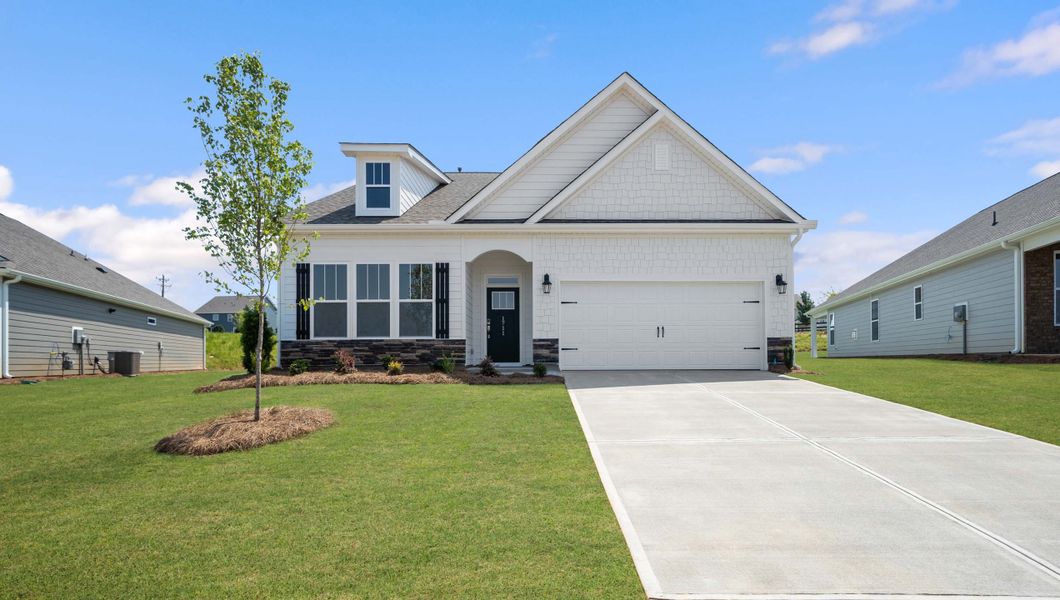 Front exterior of a new home in Sunset Summits, Spartanburg, SC, highlighting curb appeal (Image 1). Front exterior of a new home in Sunset Summits, Spartanburg, SC, highlighting curb appeal (Image 1).