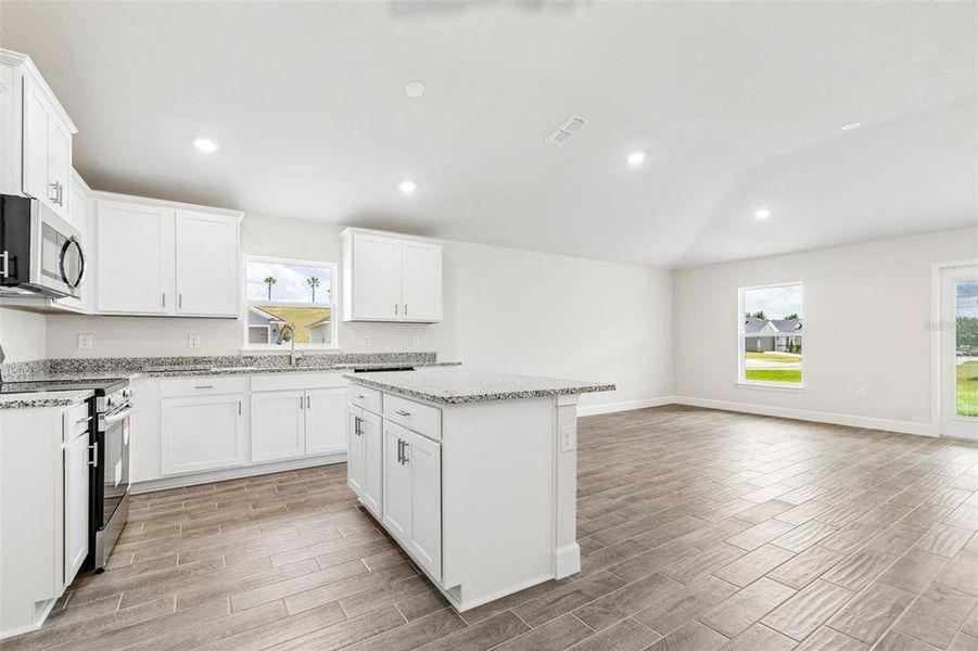 Furnished interior view inside a new home in Abbey Glen, Dade City (Image 41).
