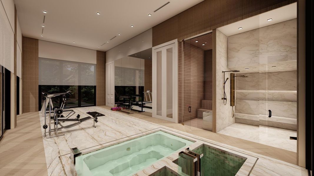 The epitome of rest and relaxation. This wellness room features a cold plunge, spa, steam room, sauna and a gym.