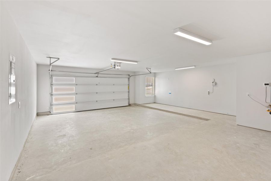 Garage featuring electric panel