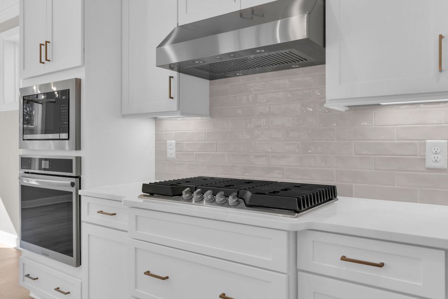 Representative furnished interior of a home built from the The Bradley by RobuckHomes in Windwater, Hampstead (Image 49).