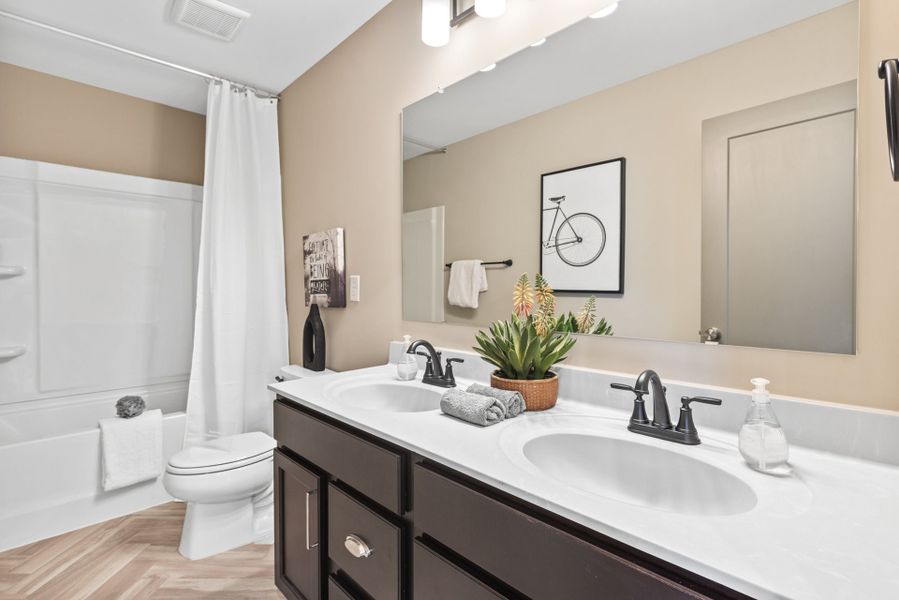Representative furnished interior of a home built from the Greenbriar by Fischer Homes in Sage Woods, Dallas (Image 36).