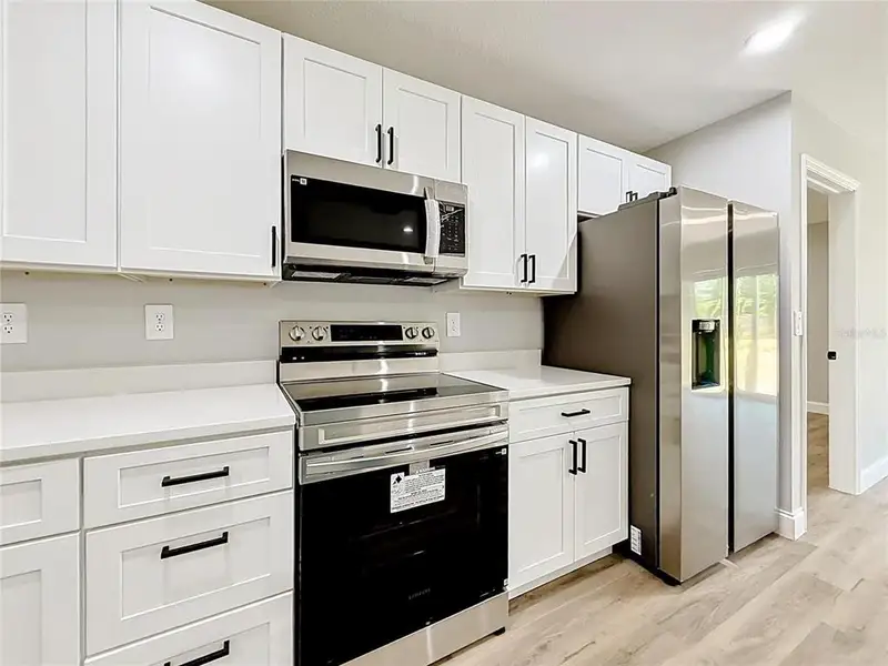 Furnished interior view inside a new home in , Ocala (Image 3).