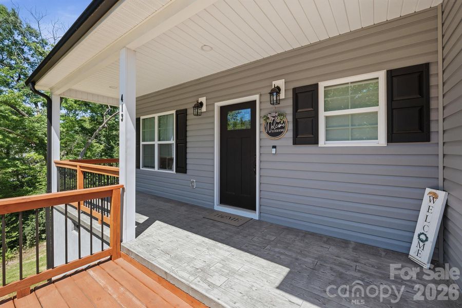Spacious Front Porch with Stamped Concrete Spacious Front Porch with Stamped Concrete