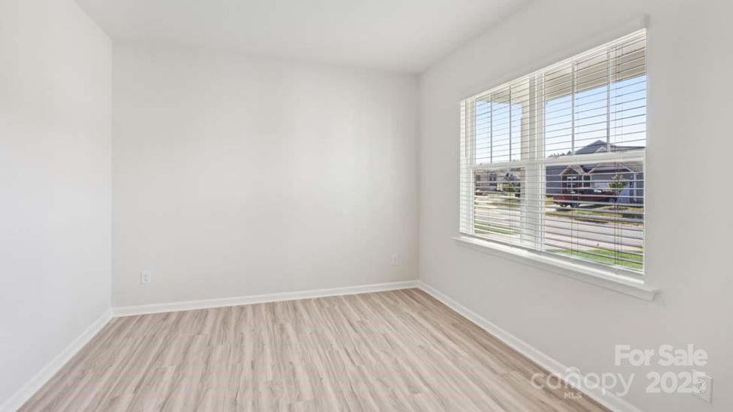 Spacious, unfurnished interior of a new home in Wallace Springs, Statesville (Image 30).