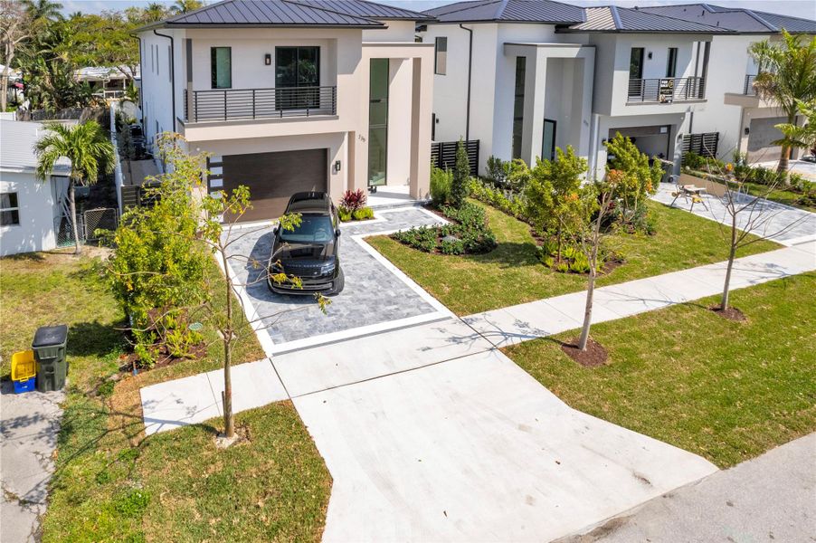 Front exterior of a new home in , Delray Beach, FL, highlighting curb appeal (Image 22). Front exterior of a new home in , Delray Beach, FL, highlighting curb appeal (Image 22).