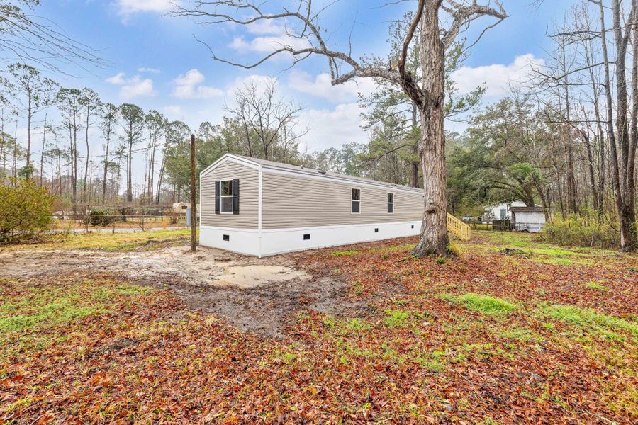 Exterior details and patio area of a home in , Summerville (Image 14).