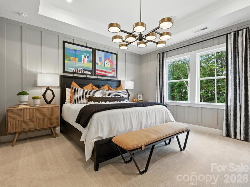Primary bedroom with tray ceilings Primary bedroom with tray ceilings