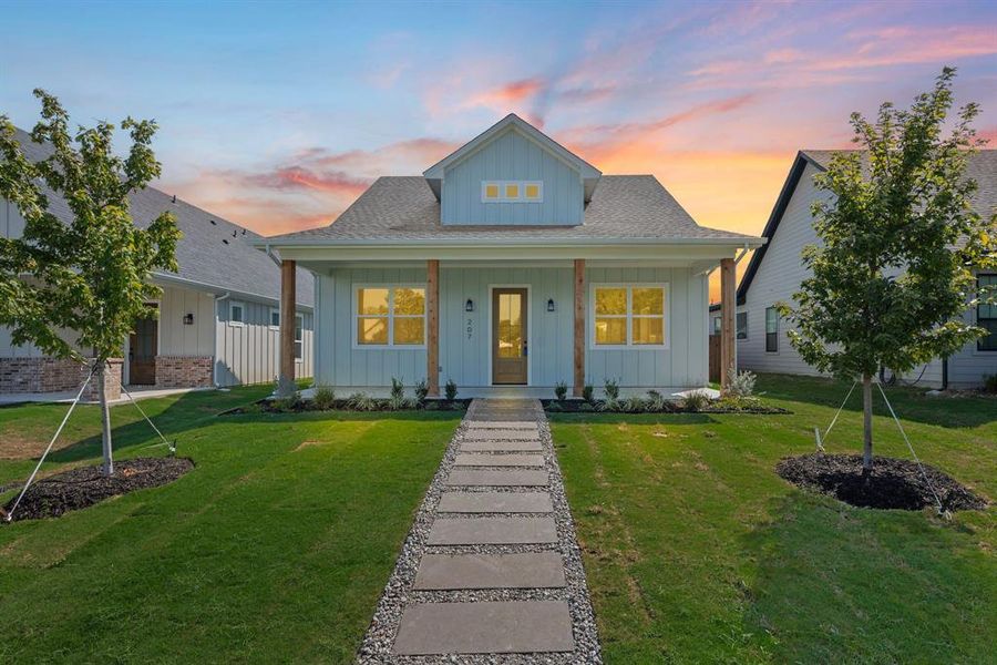Front exterior of a new home in , Justin, TX, highlighting curb appeal (Image 22).