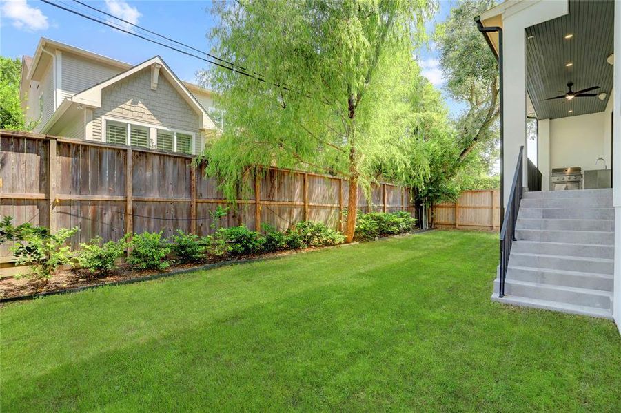 The backyard provides the perfect space for play and entertaining.