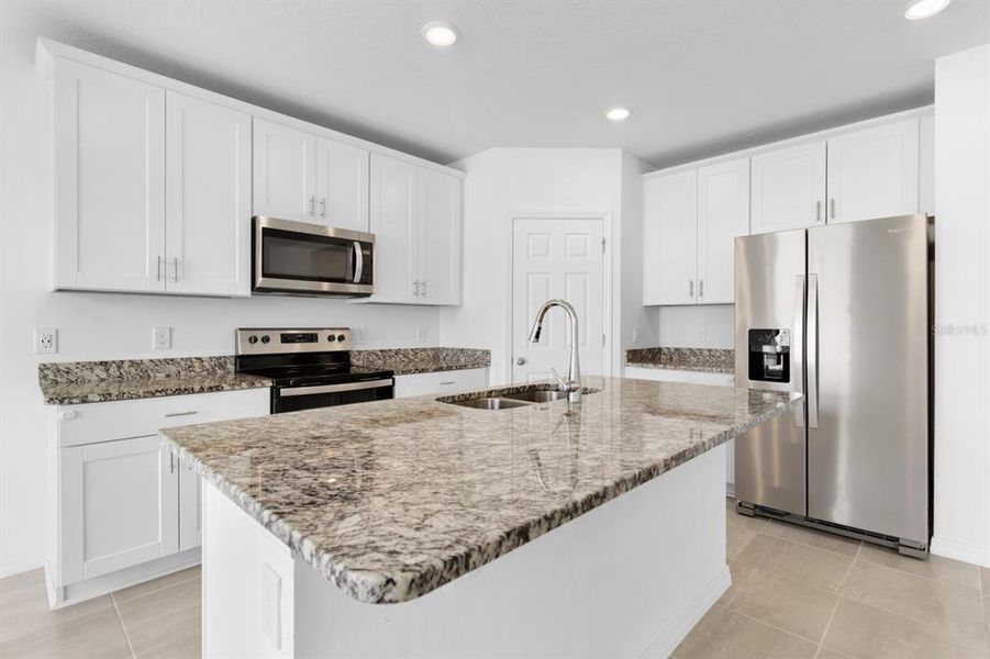 Furnished interior view inside a new home in Lawson Dunes - Signature Series, Haines City (Image 6).