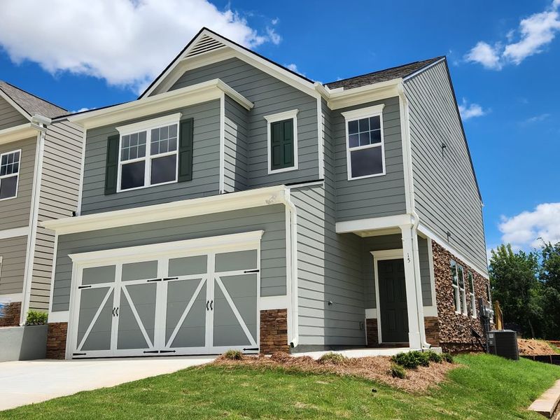 Front exterior of a new home in The Retreat at Browns Ridge, Newnan, GA, highlighting curb appeal (Image 2).