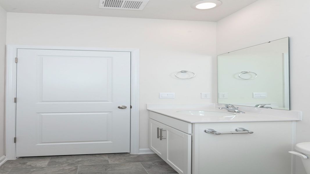 Representative furnished interior of a home built from the CAMERON by D.R. Horton in Mulberry Landing, Orangeburg (Image 12).