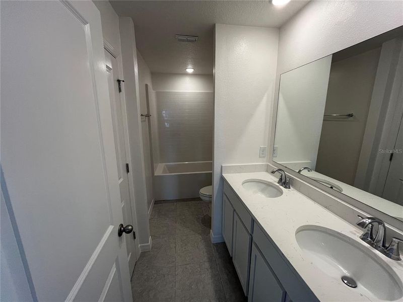 Furnished interior view inside a new home in Villa Pass, Mascotte (Image 11).