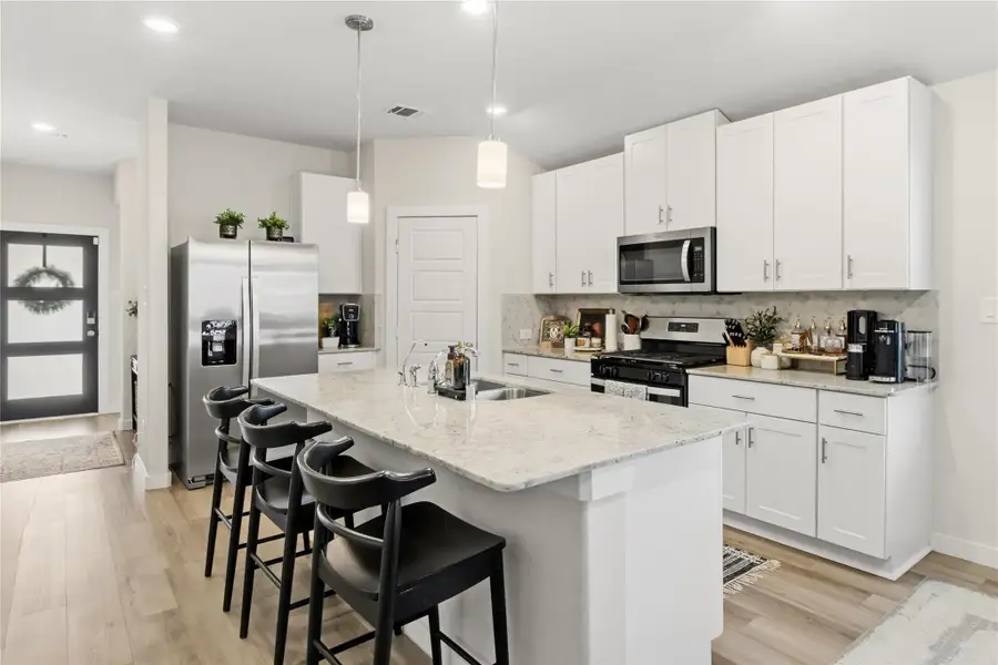 Furnished interior view inside a new home in Heights of Barbers Hill, Mont Belvieu (Image 3).