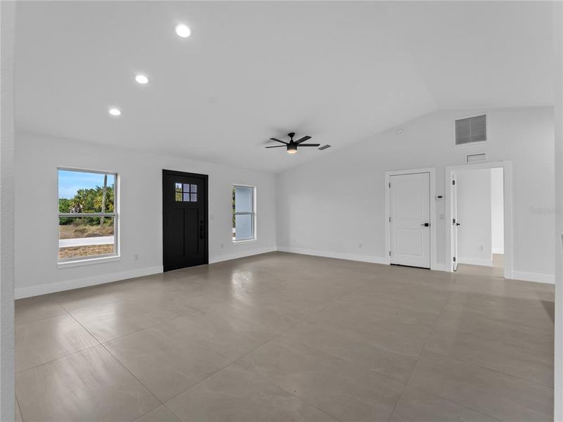 Spacious, unfurnished interior of a new home in , Port Charlotte (Image 23).