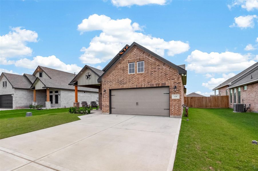 Front exterior of a new home in , Anahuac, TX, highlighting curb appeal (Image 21).