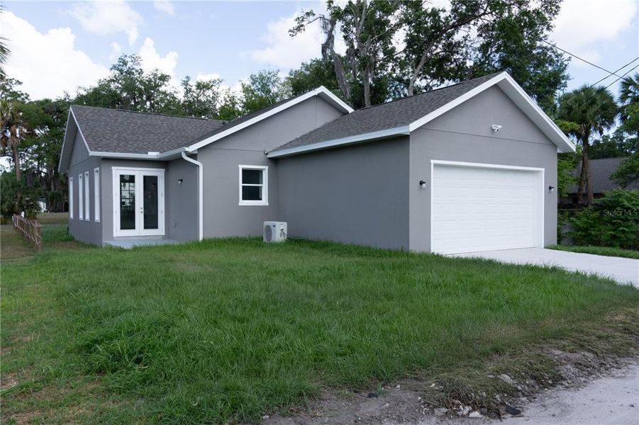 Front exterior of a new home in , Sanford, FL, highlighting curb appeal (Image 1). Front exterior of a new home in , Sanford, FL, highlighting curb appeal (Image 1).