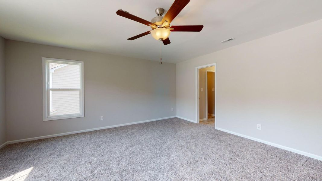 Representative unfurnished interior of a home built from the Tyler A by JC Jackson Homes,LLC in Heritage Pointe, Newport (Image 22).