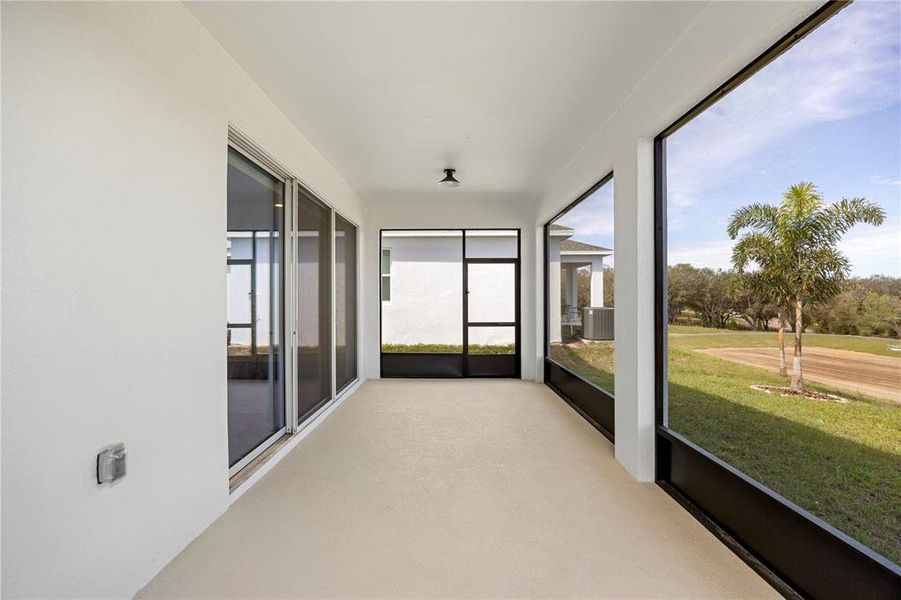 Exterior details and patio area of a home in , Groveland (Image 3).