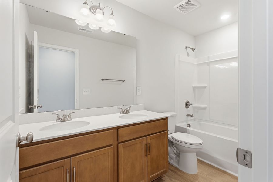 Furnished interior view inside a new home in Piper Creek, Newton (Image 14).