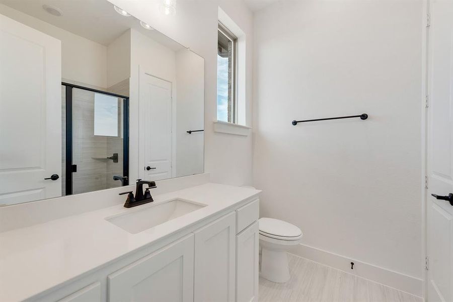 Furnished interior view inside a new home in Quail Hollow, Rockwall (Image 7).