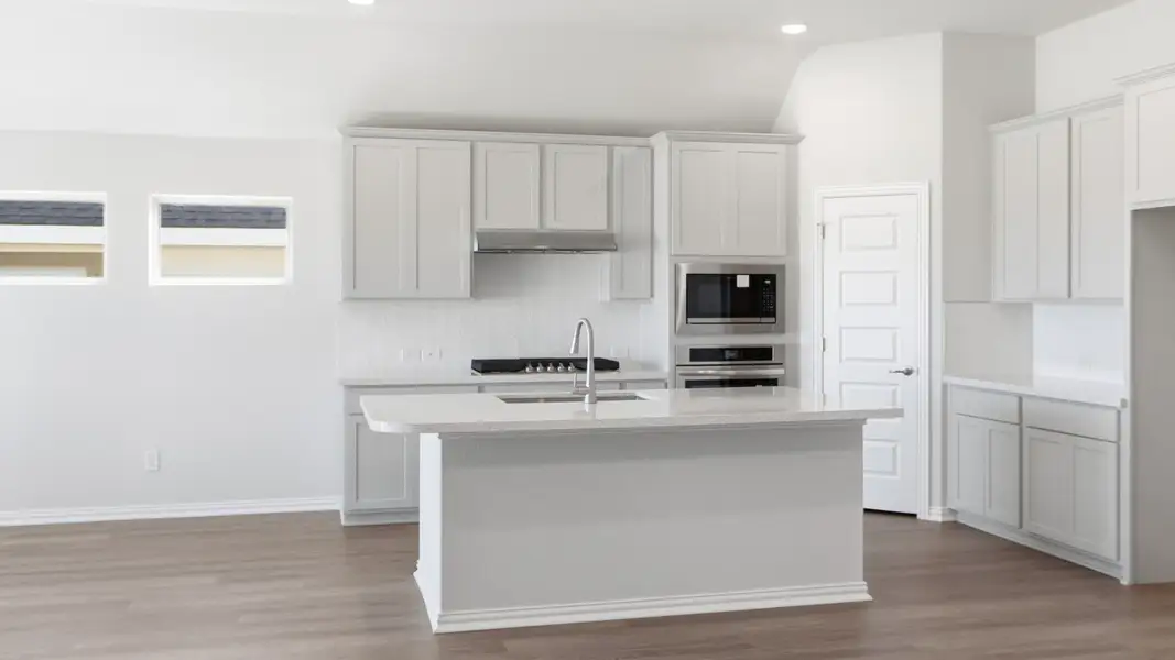 Furnished interior view inside a new home in Carillon, Manor (Image 6).