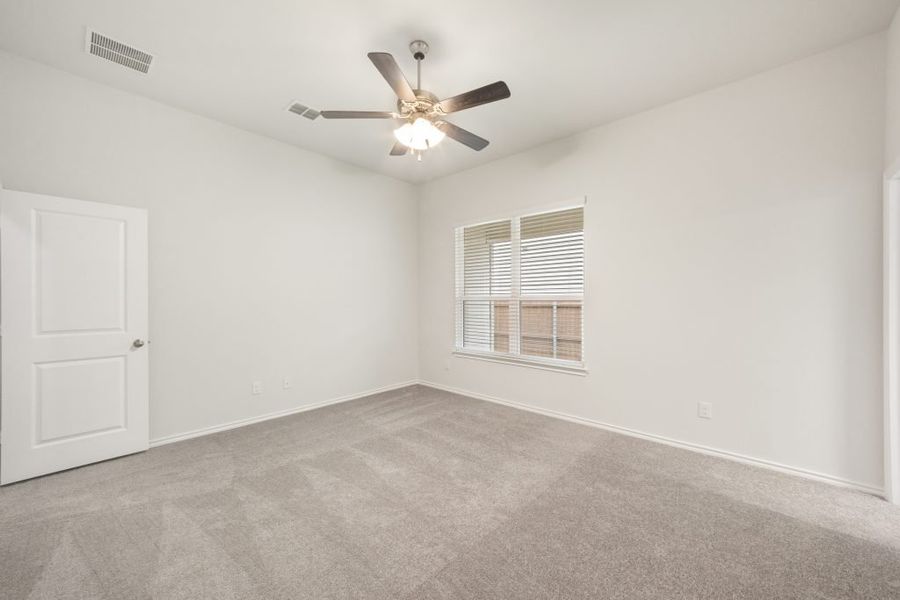 Representative exterior photo of a completed home built from the Harwood by Impression Homes in Heartland, Heartland, TX (Image 17).