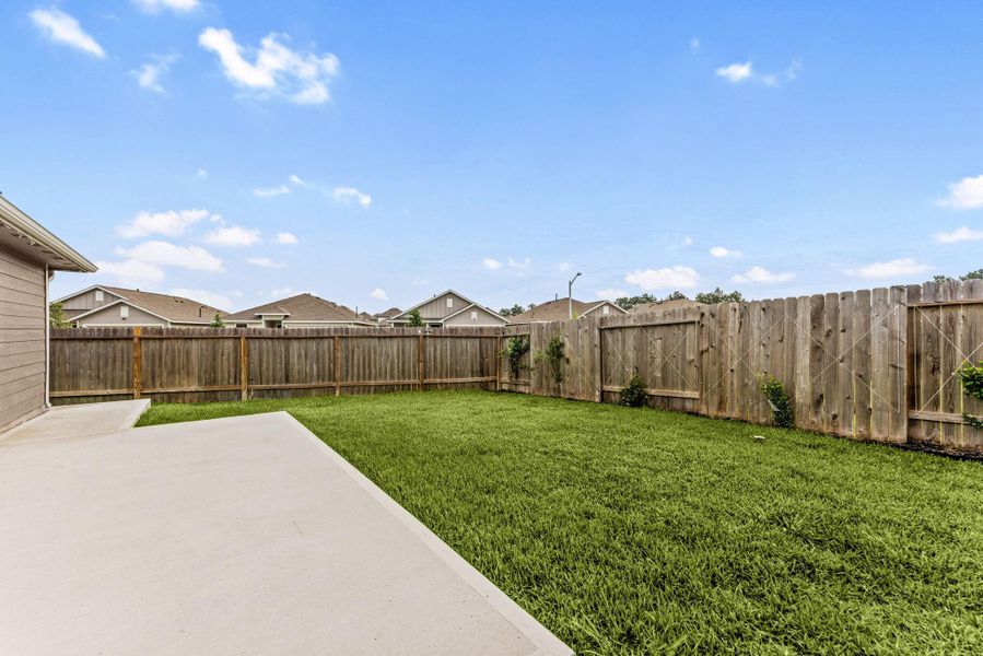 Exterior details and patio area of a home in , Splendora (Image 23).