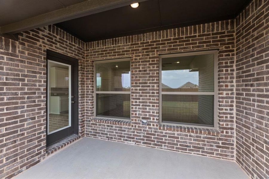 Exterior details and patio area of a home in Vista Point - Phase 1, Grandview (Image 2).