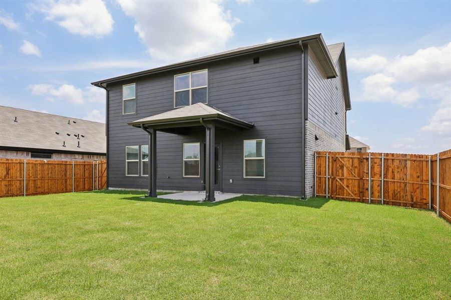 Front exterior of a new home in Westmoor, Sherman, TX, highlighting curb appeal (Image 21).