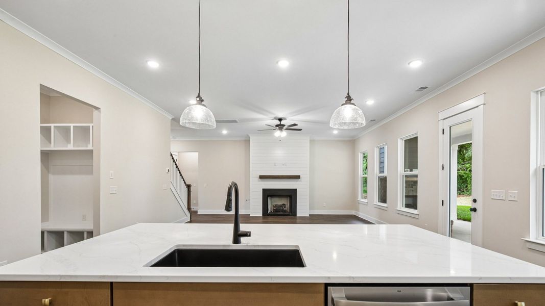 First floor with views of kitchen, spacious gathering room, and dedicated drop-zone First floor with views of kitchen, spacious gathering room, and dedicated drop-zone
