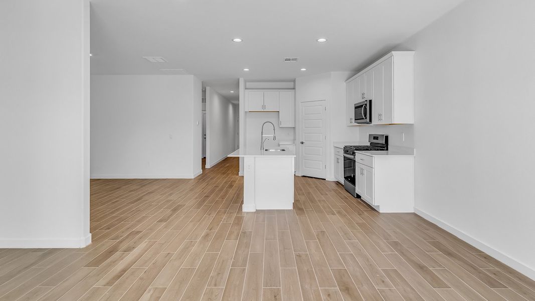 Representative unfurnished interior of a home built from the Harris by D.R. Horton in The Oasis at Rocking K, Vail (Image 33).