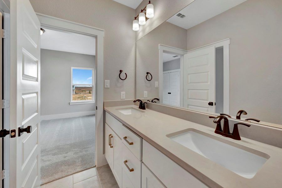 Furnished interior view inside a new home in Easthaven at Bridgeland Central - Vision Collection, Cypress (Image 12).