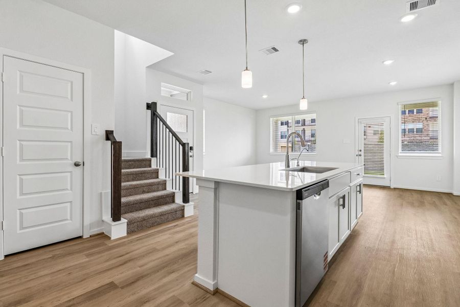 Photos are not of the actual home, but are photos of the builder home with same floorplan with similar interior finishes.