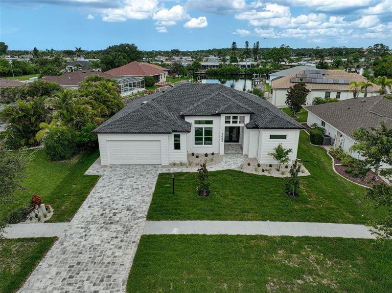 Front exterior of a new home in , North Port, FL, highlighting curb appeal (Image 32).