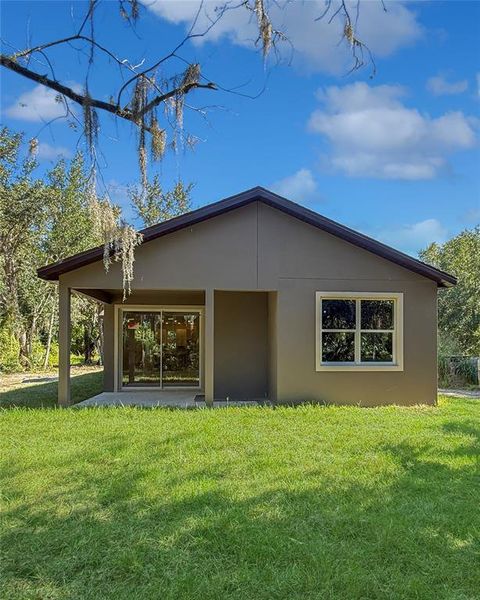 Exterior details and patio area of a home in , Sanford (Image 2).