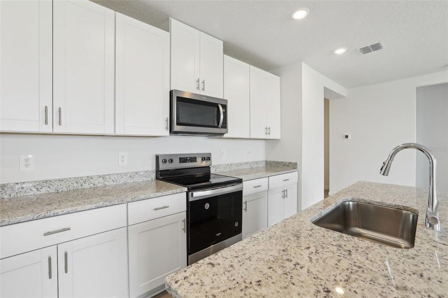Furnished interior view inside a new home in , Brooksville (Image 3).