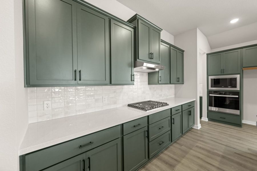 Representative furnished interior of a home built from the Sunterra Rowan 2104 by Brohn Homes in Sunterra, Katy (Image 8).