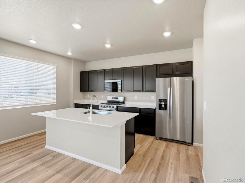 Furnished interior view inside a new home in Buffalo Highlands: The Flora Collection, Commerce City (Image 5).