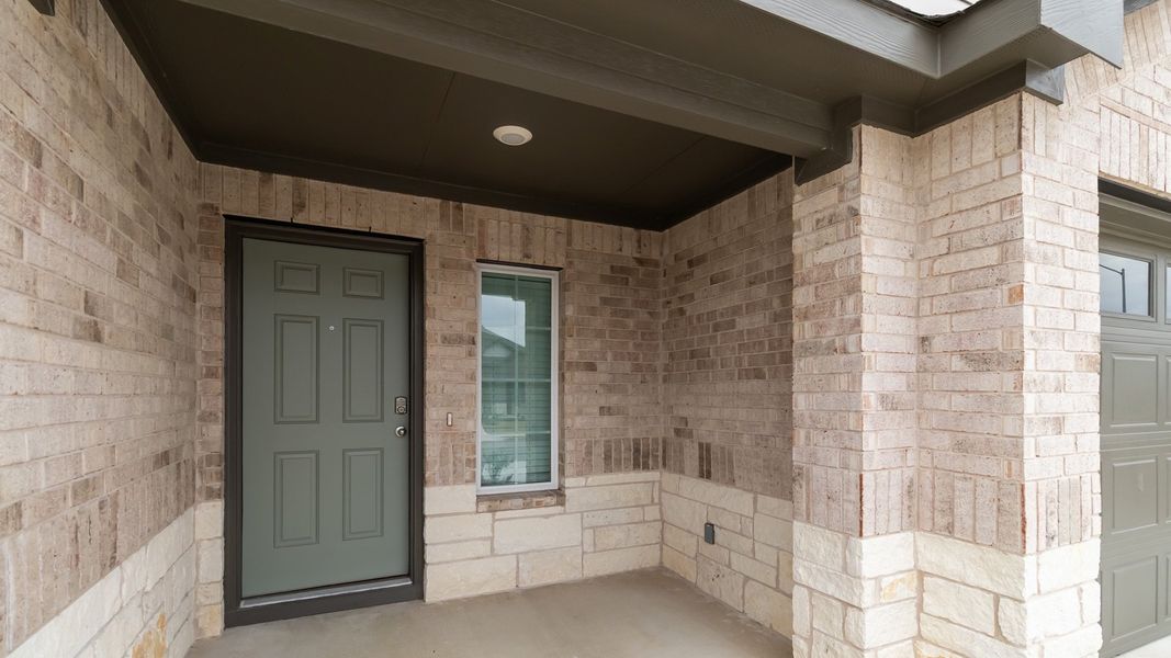 Representative exterior details of a home built from the The Juniper by D.R. Horton in Palomino, Manor (Image 3).