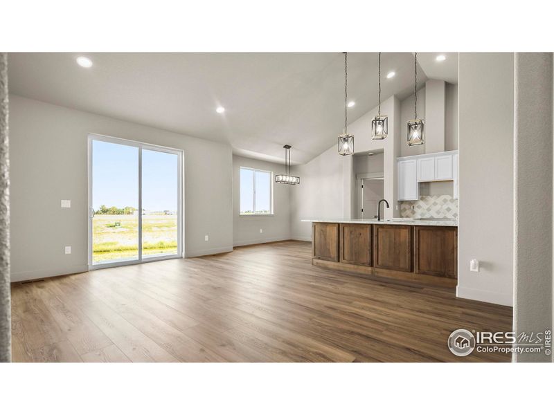 Open Living Room looking into kitchen Open Living Room looking into kitchen