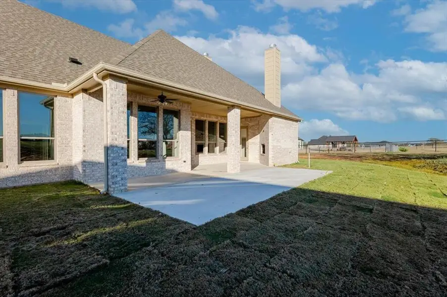 Exterior details and patio area of a home in , Poolville (Image 2). Exterior details and patio area of a home in , Poolville (Image 2).