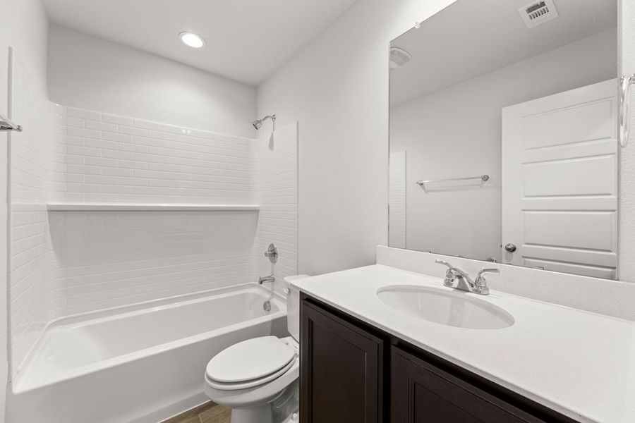 Representative exterior photo of a completed home built from the Lincoln by Impression Homes in ValleyBrooke, Mesquite, TX (Image 22).