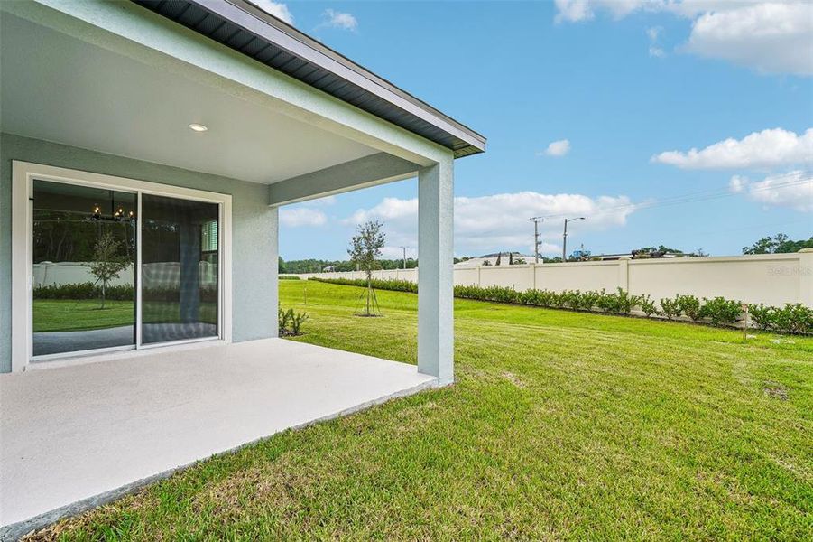 Exterior details and patio area of a home in Legends Preserve - Signature Series, Daytona Beach (Image 27).