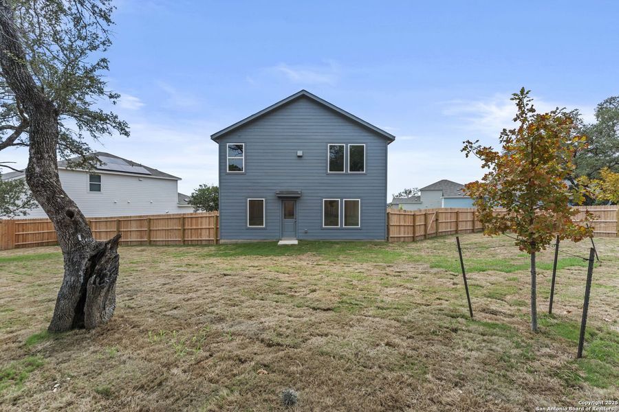 Front exterior of a new home in Waterwheel: Cottage Collection, San Antonio, TX, highlighting curb appeal (Image 2). Front exterior of a new home in Waterwheel: Cottage Collection, San Antonio, TX, highlighting curb appeal (Image 2).