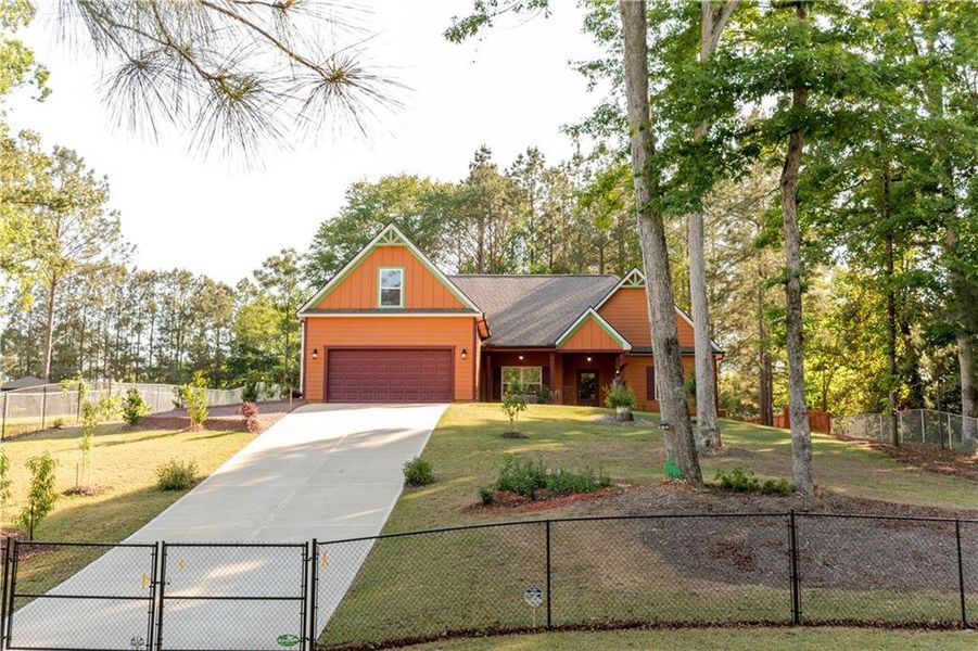Front exterior of a new home in , Mansfield, GA, highlighting curb appeal (Image 20).